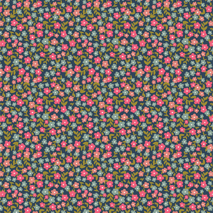 Small floral patterned fabric with pink and green flowers on a dark blue background