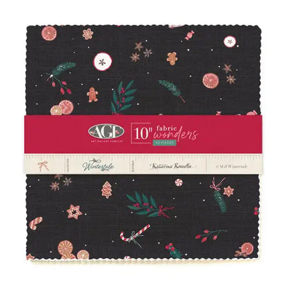 A bundle of art gallery fabric squares featuring a winter holiday theme with designs including Christmas trees and ornaments on a dark background.