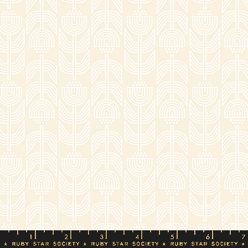 Patterned fabric with geometric design on a beige background, featuring Ruby Star Society label.