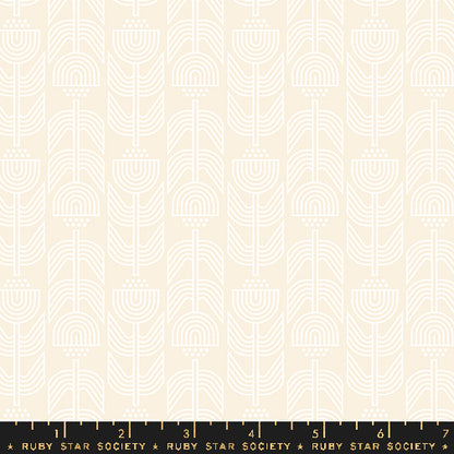 Patterned fabric with geometric design on a beige background, featuring Ruby Star Society label.