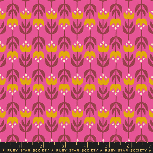 Patterned fabric with yellow and brown flowers on a pink background, featuring Ruby Star Society label.