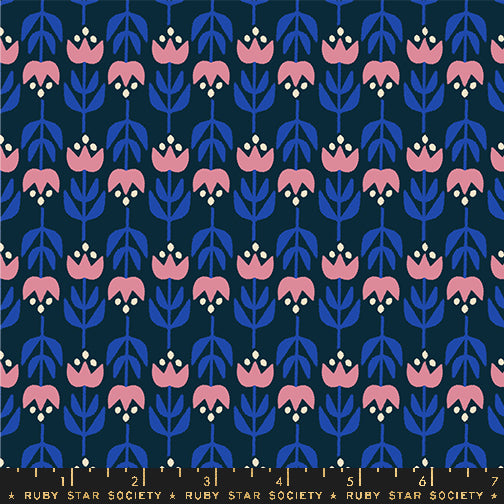 Patterned fabric with pink and blue floral design on a navy background, featuring Ruby Star Society label.