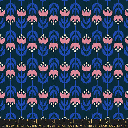 Patterned fabric with pink and blue floral design on a navy background, featuring Ruby Star Society label.