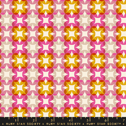 Patterned fabric with geometric design in pink, orange, and white on a beige background, featuring Ruby Star Society label.