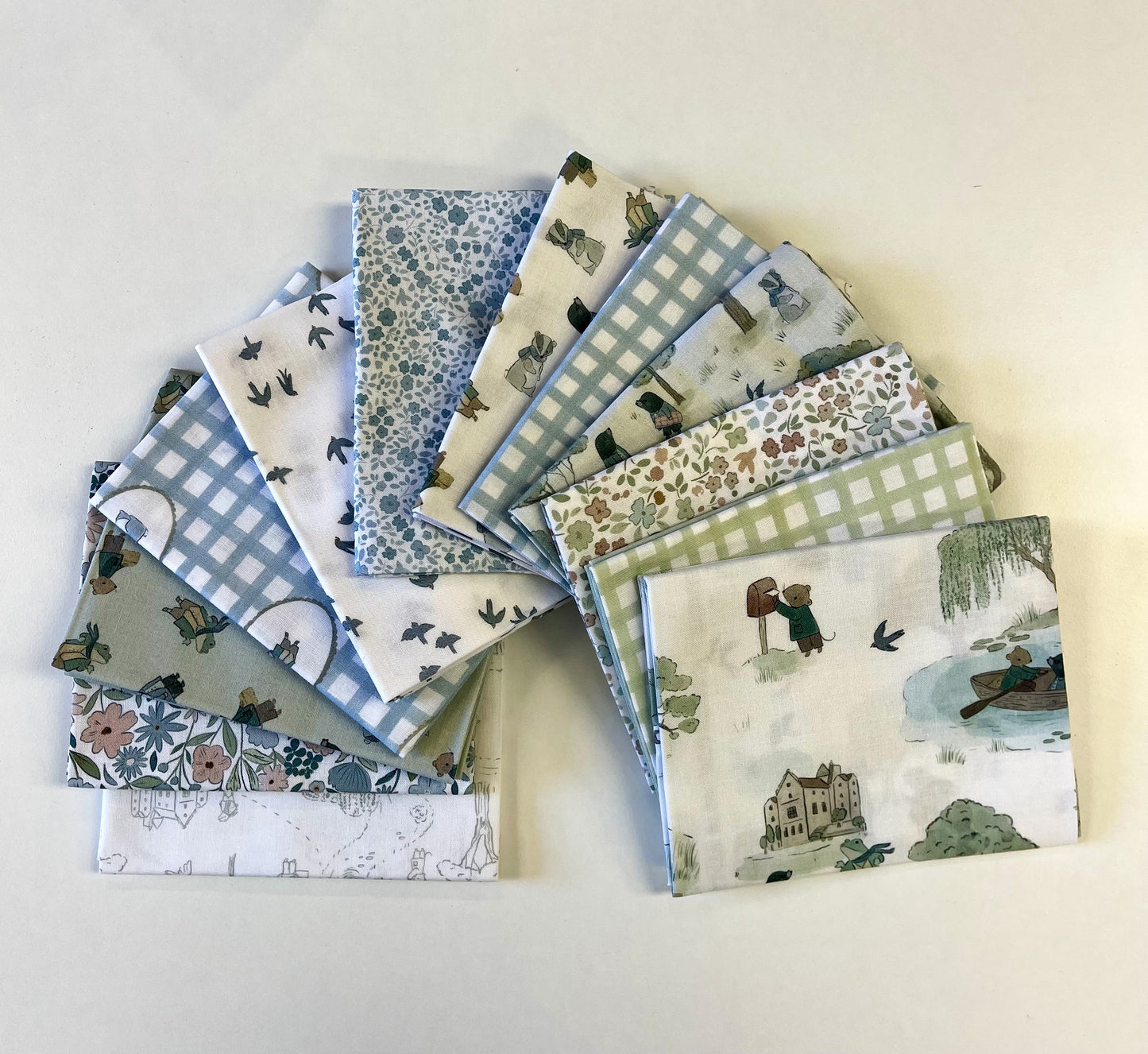Collection of patterned fabric squares on a light background