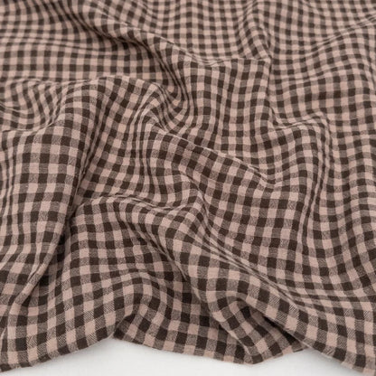 Close-up of brown and beige checkered cotton yarn dyed fabric