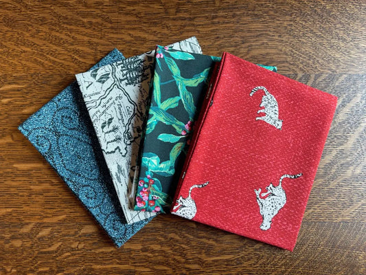 Bundle of 4 fat quarter fabric pieces with a jungle theme. From Boscage art gallery fabric line. 100% premium cotton for sewing and crafting.