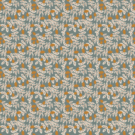 A fabric with a blue background and white and gold trellis pattern. From wild cottage collection figo fabrics fat quarter bundle.