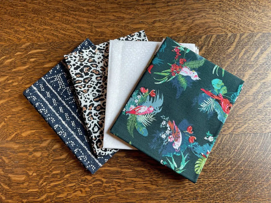 Bundle of 4 fat quarter fabric pieces with a jungle theme. From Boscage art gallery fabric line. 100% premium cotton for sewing and crafting.
