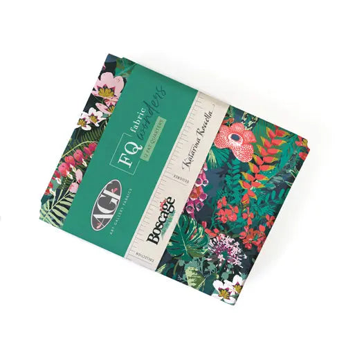 A stack of fat quarters featuring a floral pattern in various colors on a green background, with the brand name 'Art Gallery Fabrics' and the designer's name 'Katarina Roccella' visible on the packaging. 100% cotton for sewing, quilting and crafting.