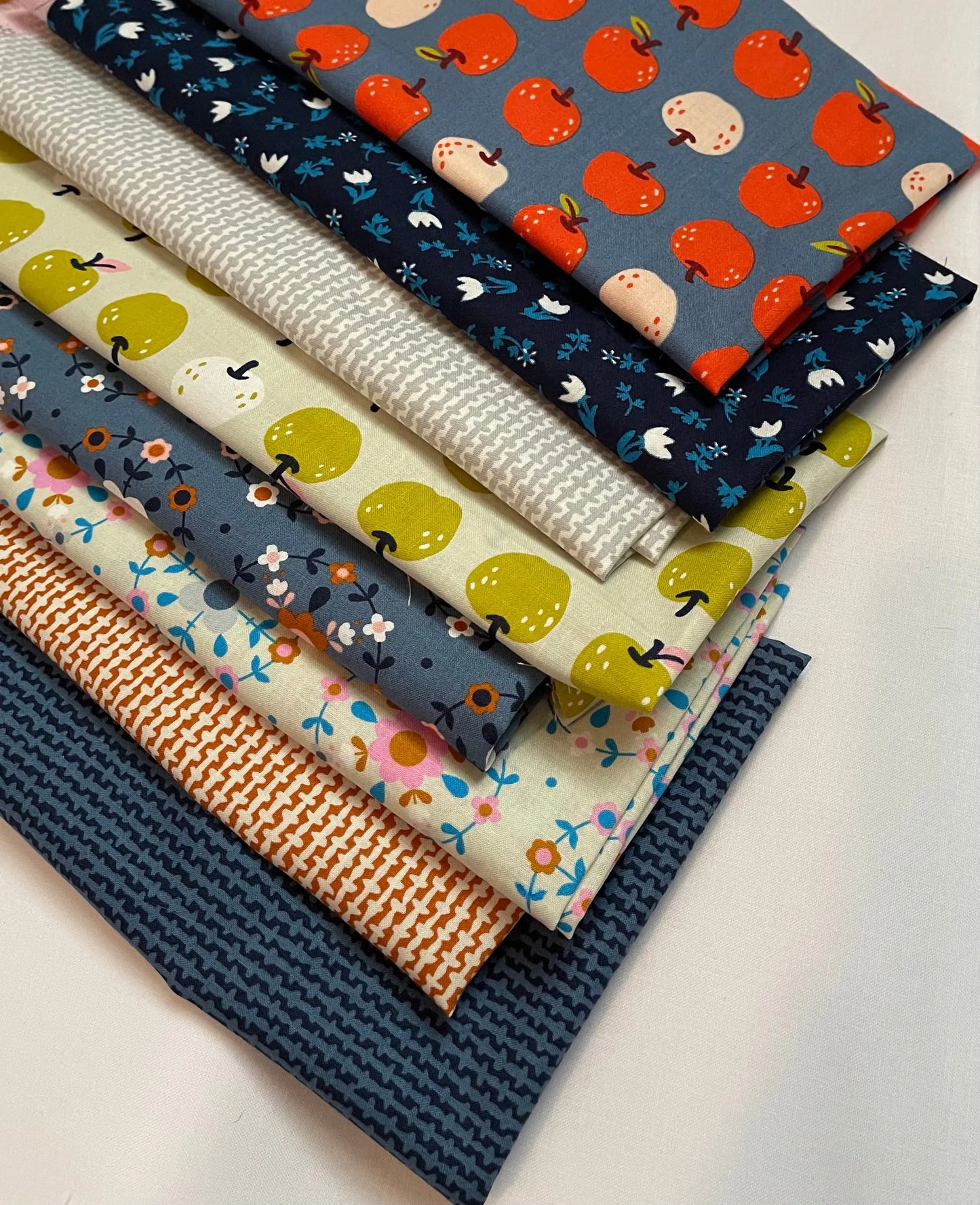 A variety of eight fat quarter bundles, each featuring Smol by Ruby Star Society. 100% premium cotton. 