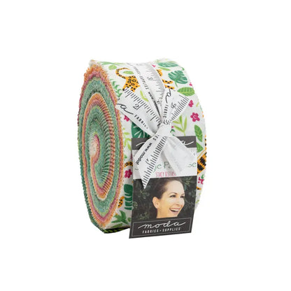 Fabric with a yellow background and large leaf and frog illustrations. From Jungle Paradise by Stacy Iest. Bundle of 40 - 2.5" x 40" Strips 100% Premium Cotton for quilting and crafting
