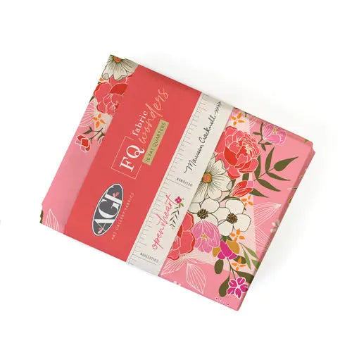 A bundle of 16 fat quarters of Art Gallery Fabrics with floral patterns. Open Heart by Maureen Cracknell