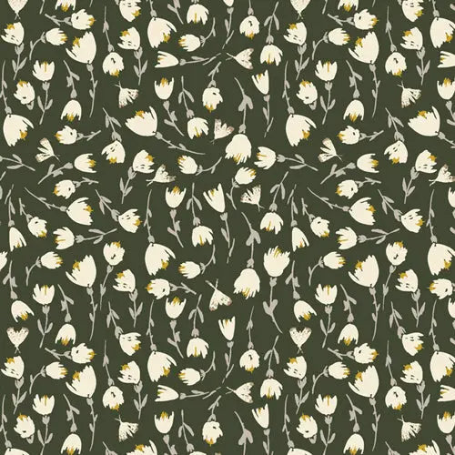Rayon fabric with a green background and small what flower pattern. For sewing flowy garments.
