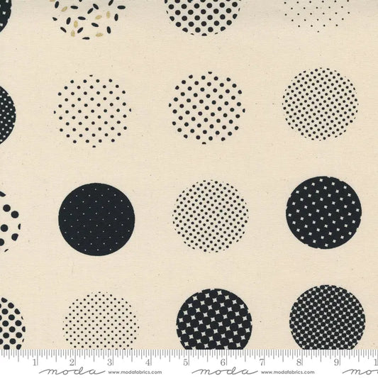 Fabric with a natural background and black circle illustrations. 100% Cotton canvas for sewing and crafting. 